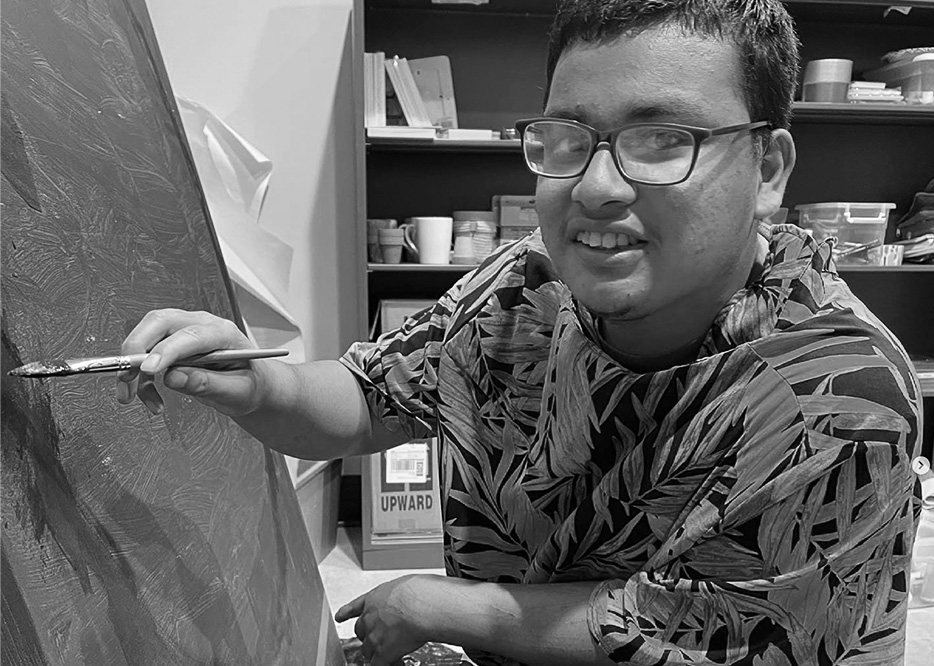 - REVEL young adult painting a picture