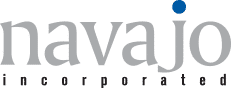 Navajo Incorporated logo: gray wordmark with a small blue dot above the i on a white background